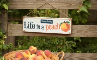 Life Is a Peach" Deep Eddy Sign